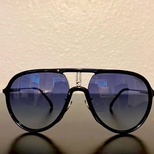 Black Carrera sun glasses with silver trimming.